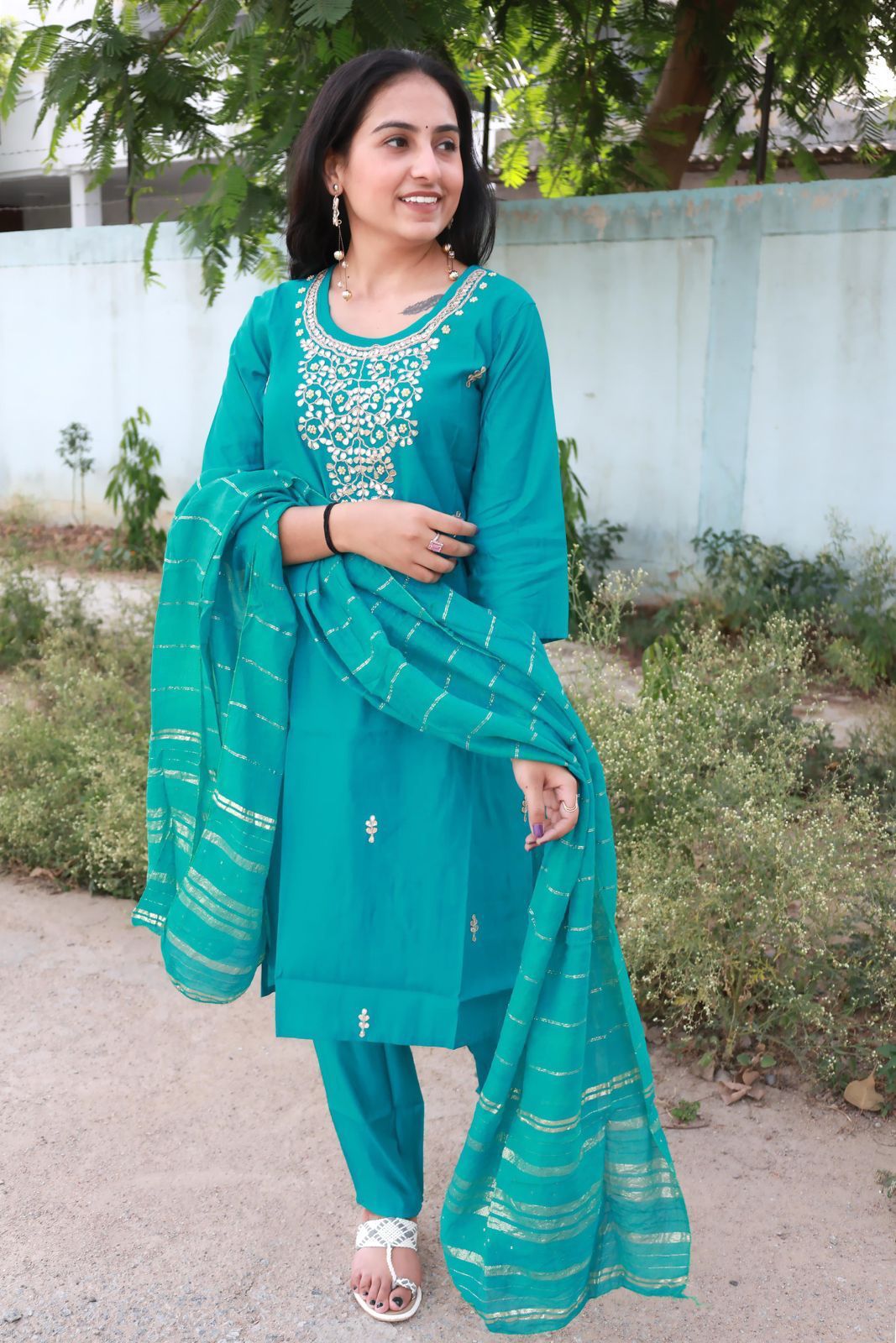 Beautiful Roman modal Silk Round Neck Kurti with Classy Comfort Pant and Chiffon Jacquard Sequence work dupatta, Beautiful Hand Heavy Gota Patti work on Kurti with Moti Work.