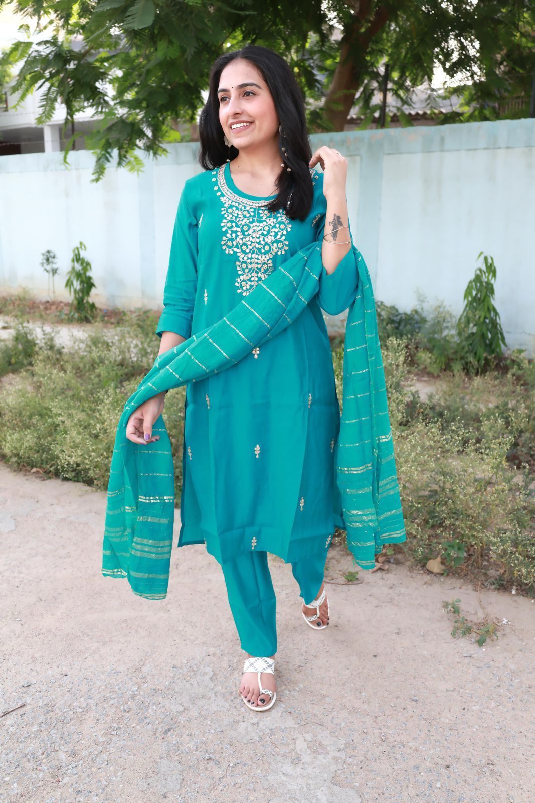Beautiful Roman modal Silk Round Neck Kurti with Classy Comfort Pant and Chiffon Jacquard Sequence work dupatta, Beautiful Hand Heavy Gota Patti work on Kurti with Moti Work.